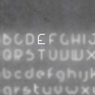 Настенный светильник Artemide Alphabet 1211E00A + supp Настенный светильник Artemide Alphabet 1211E00A + supp