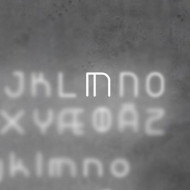 Настенный светильник Artemide Alphabet 1211M00A Настенный светильник Artemide Alphabet 1211M00A